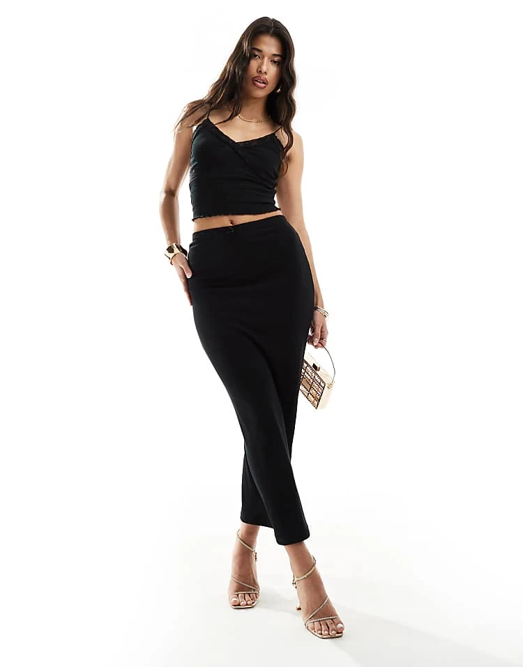 Kaiia Ribbed Bow Detail Cami Top And Midaxi Skirt Co-ord In Black 5 Kaiia Ribbed Bow Detail Cami Top And Midaxi Skirt Co-ord In Black - Image 3