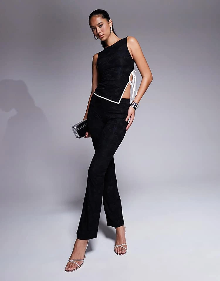 Kaiia Exclusive Lace High Neck Sleeveless Tie Side Asymmetric Hem Top And Flared Trousers Co-ord In Black 3 Kaiia Exclusive Lace High Neck Sleeveless Tie Side Asymmetric Hem Top And Flared Trousers Co-ord In Black