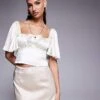 Kaiia Exclusive Satin Flutter Sleeve Tie Ruched Bust Milkmaid Top In Cream For Women White